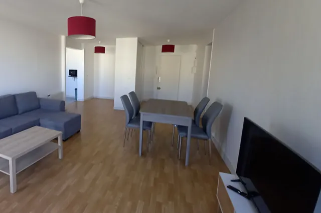 Séjour d’un grand appartement du centre-ville